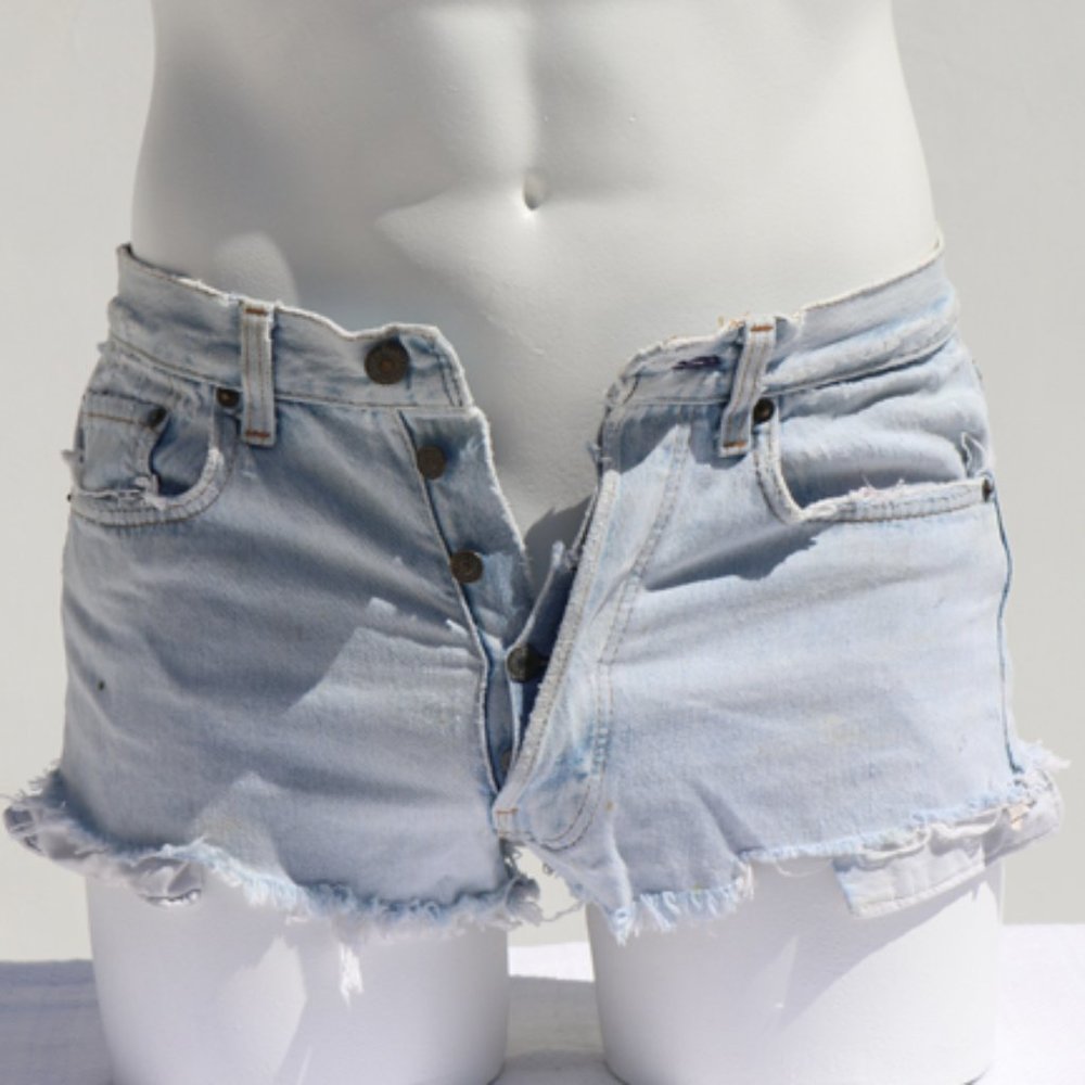 80's cut off Levis shorts. Distressed.